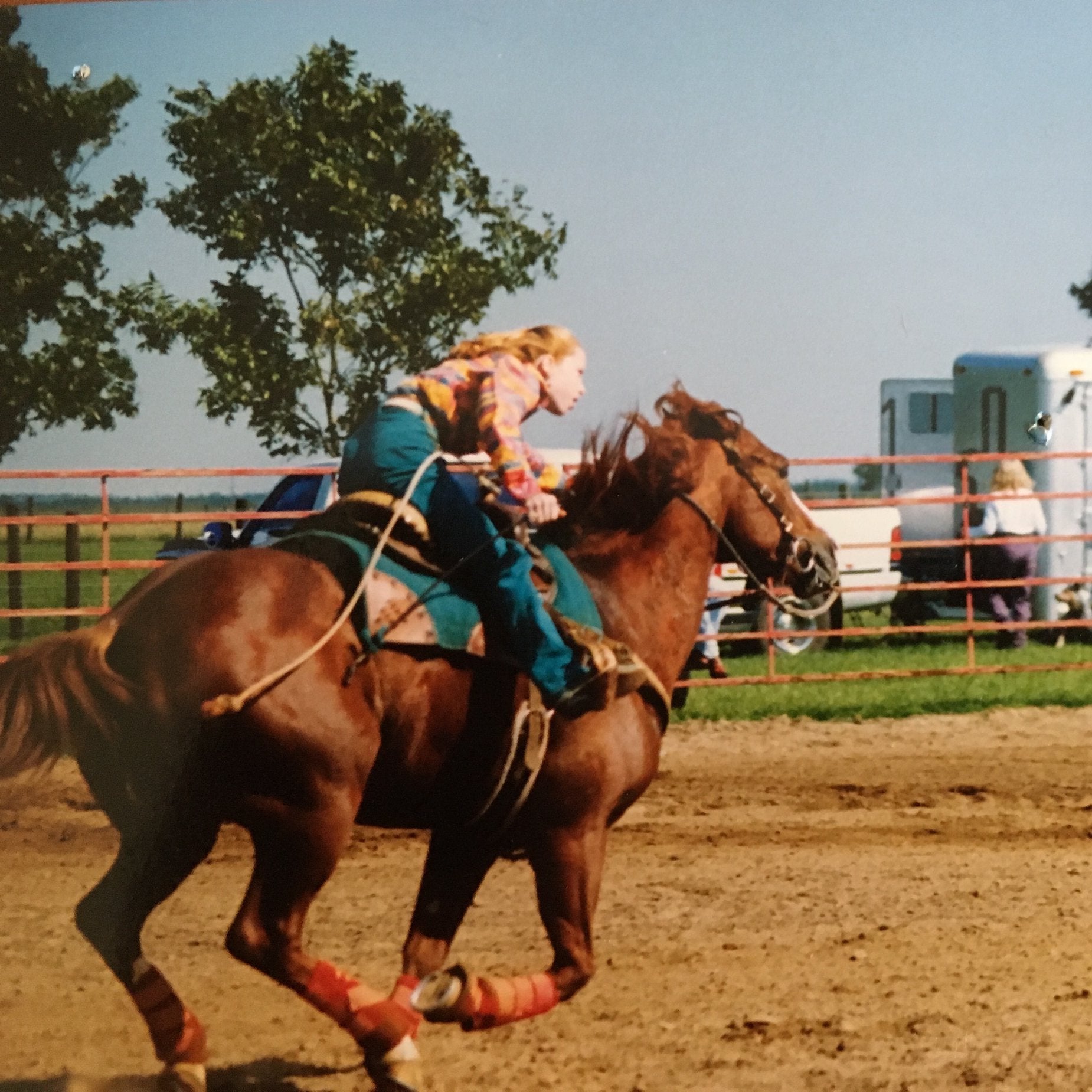 Jennifer Claire Moore riding her horse